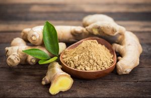 ginger root and ground ginger in a bowl