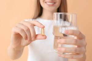 woman taking supplements