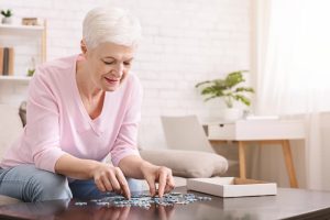 woman doing a puzzle