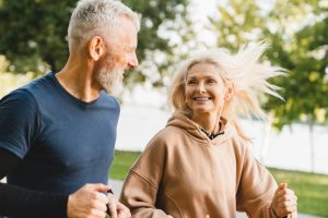 man walking with wife and smiling