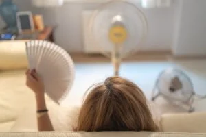 woman experiencing a hot flash 