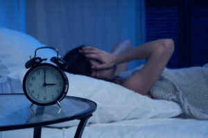 woman struggling with insomnia